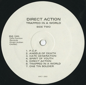 Direct action trapped in a world label 02