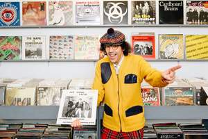 Narduwar holding candas first hip hop record %28get loose crew%29 in june records