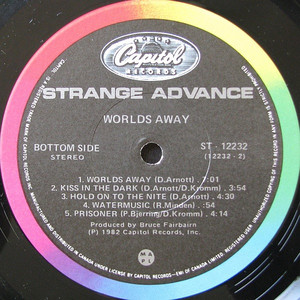 Strange advance   worlds away %283%29