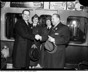 Mayor allan lamport %28right%29 and ttc staff at official opening of yonge street subway march 30th  1954