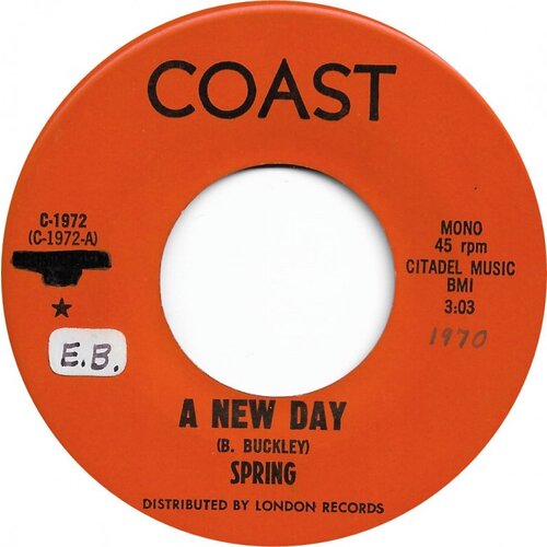 A New Day b/w She's a Woman