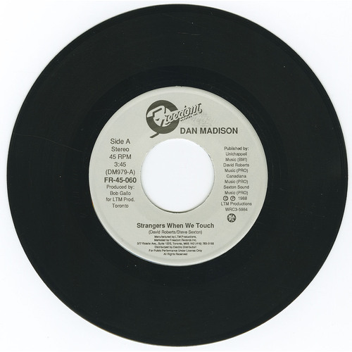 Strangers When We Touch b/w Feel the Pressure