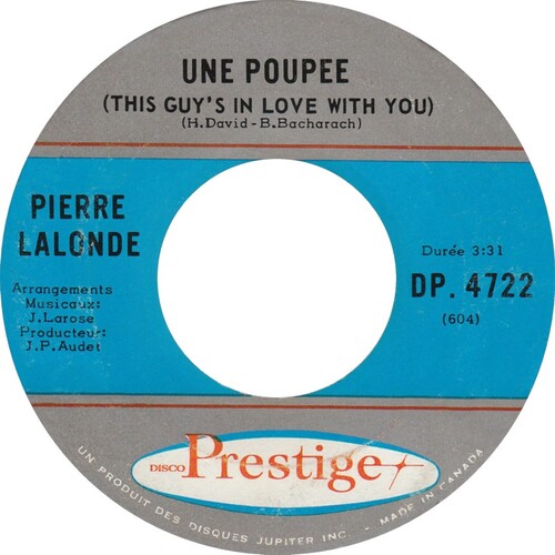 Une Poupée (This Guy's In Love With You) b/w Le Temps Des Feuilles Mortes (By The Time I Get To Phoenix)